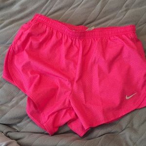 Pink Nike running shorts